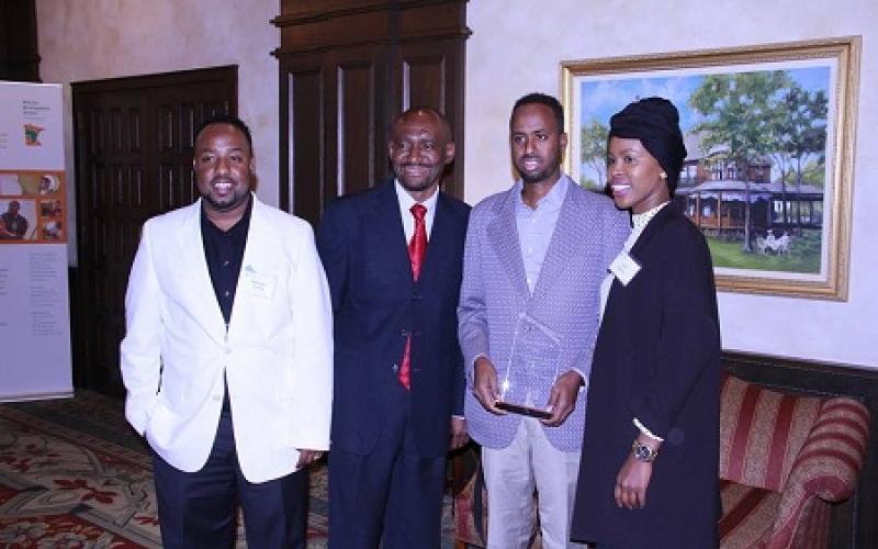 Owners of Amin Grocery Store, LLC, WIllmar with Nasibu Sareva and Commissioner Shawntera Hardy