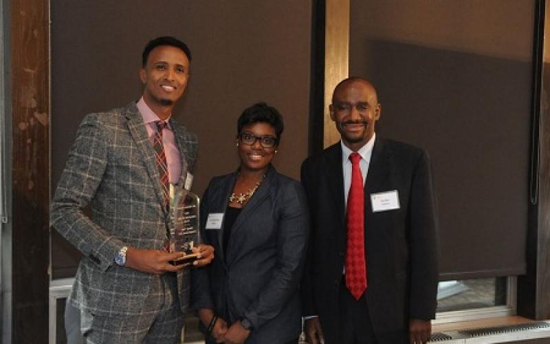 Owner of Family Care Transportation, LLC, Minneapolis with Nasibu Sareva and Commissioner Shawntera Hardy