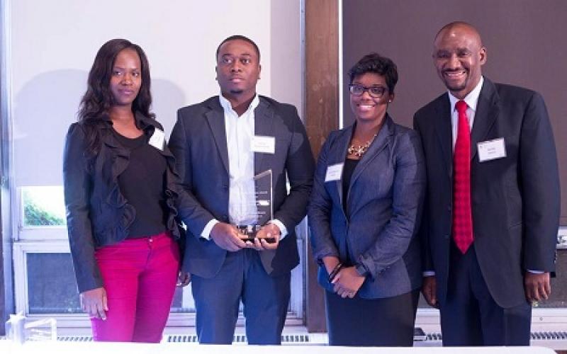 Owners of Liz Vision Beauty Supply, LLC, Champlin with Nasibu Sareva and Commissioner Shawntera Hardy