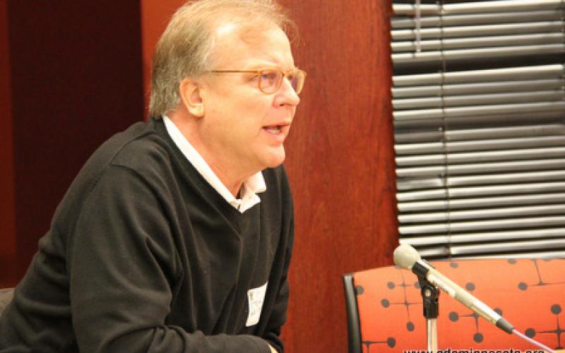 A participant speaks to the gathering