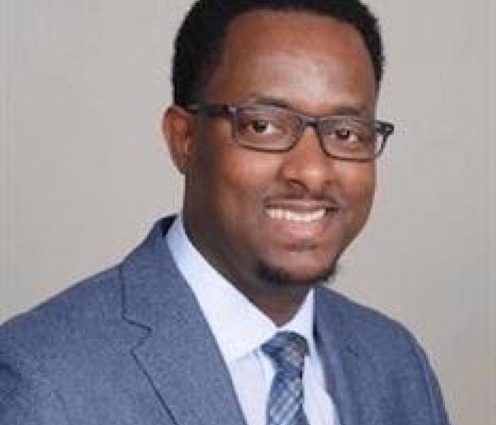 Christian Ayalew is a loan committee member at the African Development Center, MN Headshot of Christian Ayalew