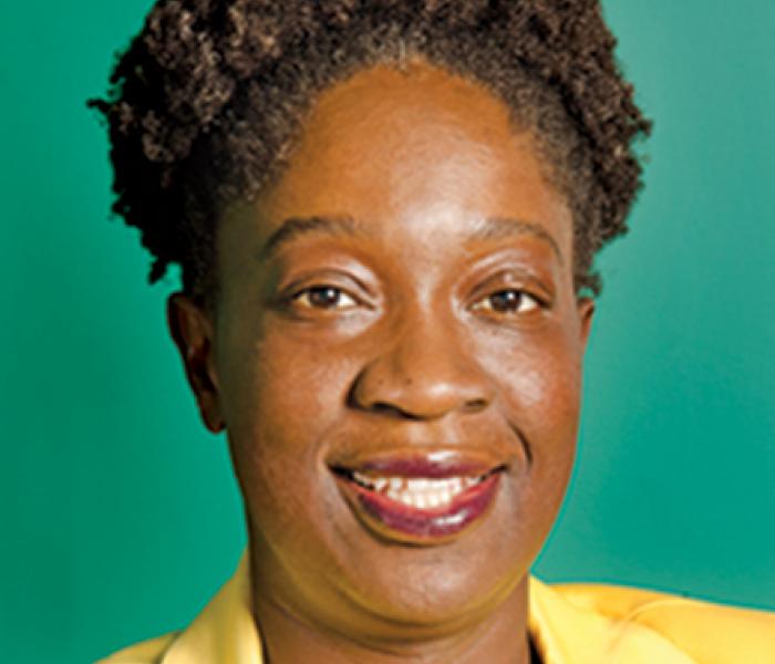 Leah Mtegha is Board Secretary of African Development Center, MN Headshot of Leah Mtegha