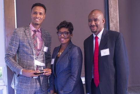 Nasibu Sareva and Commissioner Shawntera Hardy 